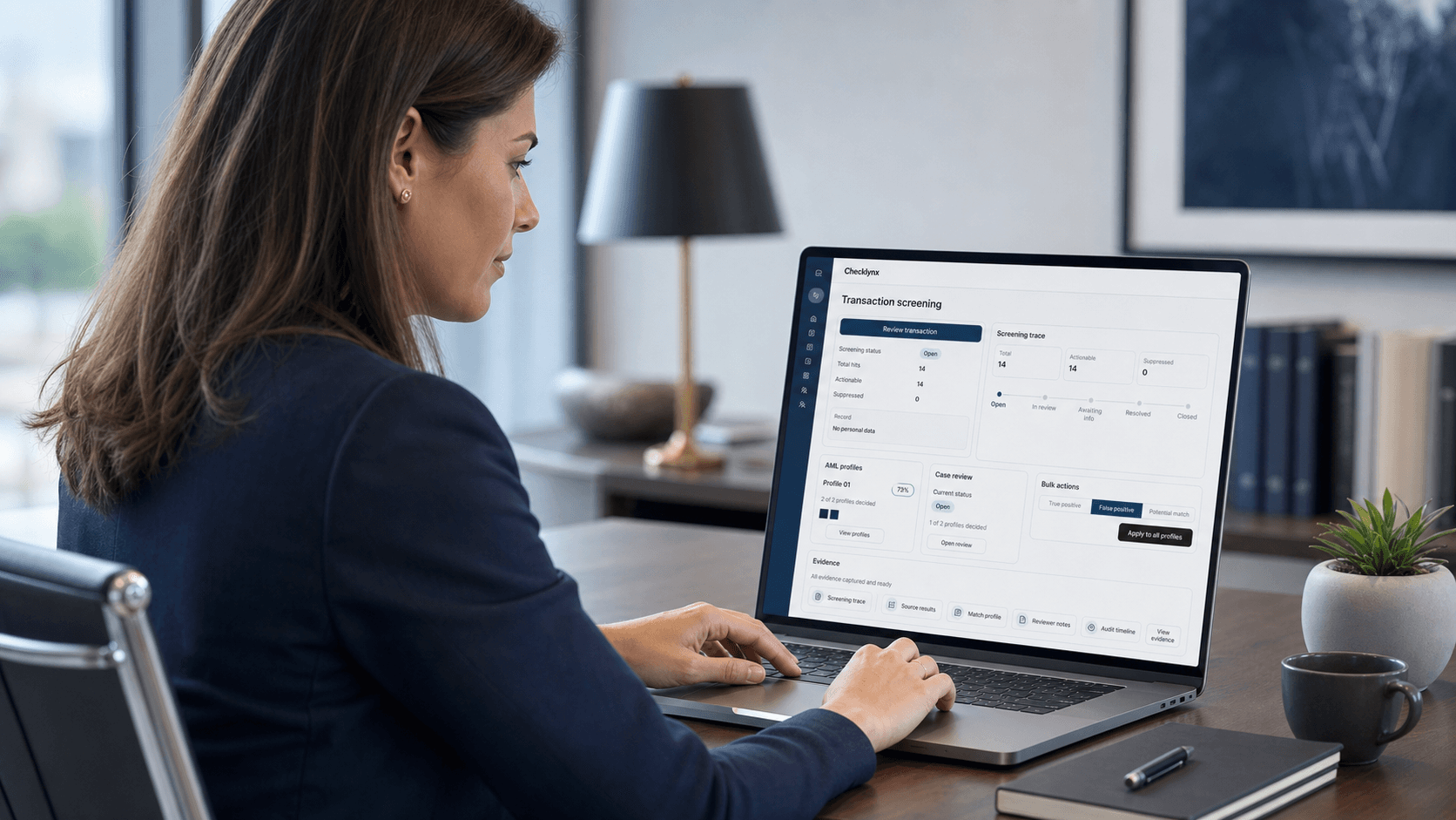 Compliance reviewer using Checklynx transaction screening